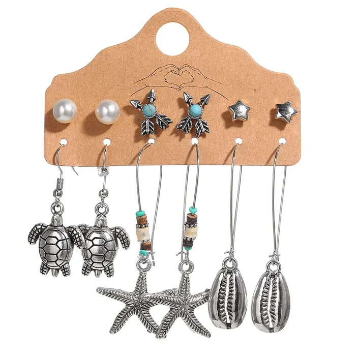 Earrings Yellow Chimes Yellow Chimes Combo of 12 Pairs Oxidised Silver Gold Plated Tortoise Starfish Pearl Face Flower Design Drop Stud Earrings Set for Women and Girls Gold Silver Medium