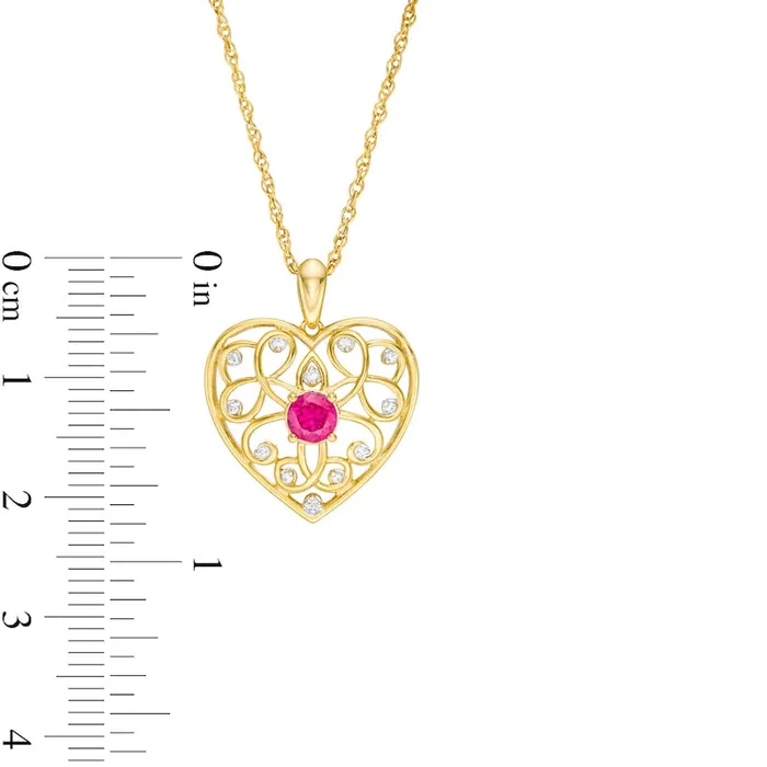 40mm LabCreated Ruby and 005 CT TW Diamond Filigree Heart Pendant in 10K Yellow Gold Goldia Necklaces 40mm LabCreated Ruby and 005 CT TW Diamond Filigree Heart Pendant in 10K Yellow Gold Goldia Necklaces