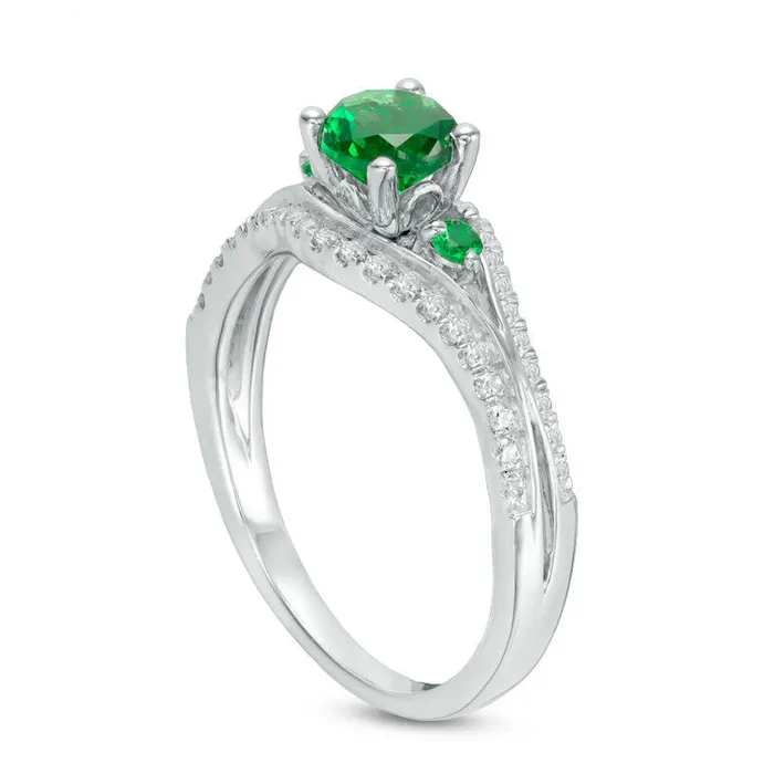 Goldia Rings 50mm LabCreated Emerald and 025 CT TW Diamond Split Shank Engagement Ring in Sterling Silver Goldia Rings 50mm LabCreated Emerald and 025 CT TW Diamond Split Shank Engagement Ring in Sterling Silver