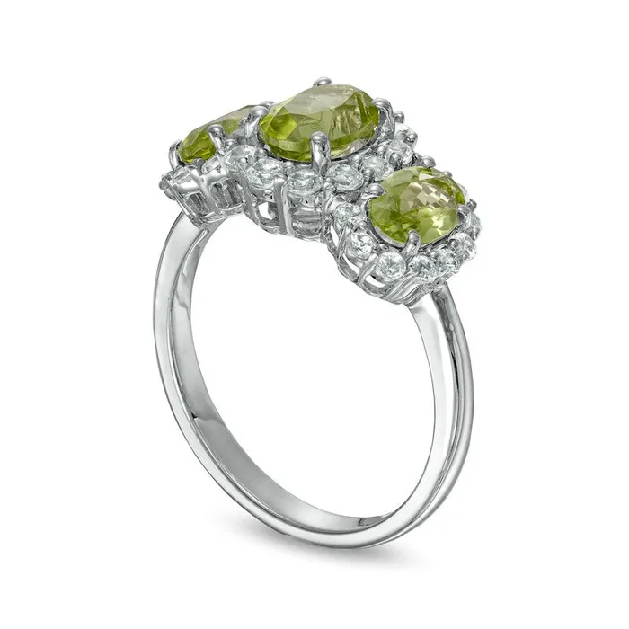 Goldia Rings Oval Peridot and White LabCreated Sapphire Frame Three Stone Ring in Sterling Silver Goldia Rings Oval Peridot and White LabCreated Sapphire Frame Three Stone Ring in Sterling Silver